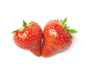 Pair of red strawberries isolated