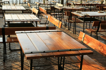 Empty tables and chairs in restaurant