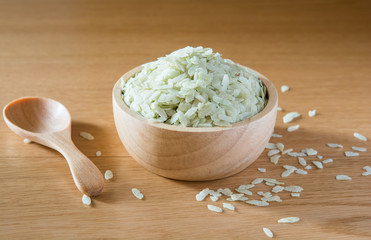 shredded rice grain on wood Bowl