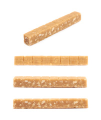 Toffee candy with nuts isolated