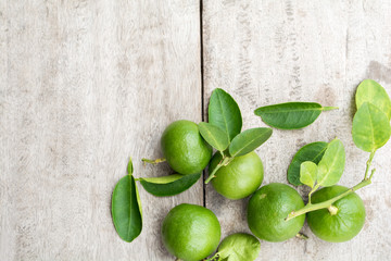 Green Lemons on a Table
