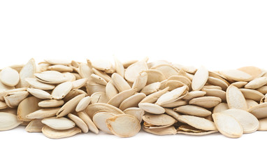 Line of pumpkin seeds isolated