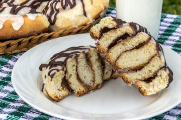 Homemade cinnabon cinnamon buns with cream cheese glaze and chocolate icing