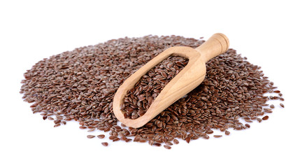 Flax seeds heap in wood scoop isolated on white background