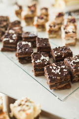 Different kinds of baked sweets on a buffet