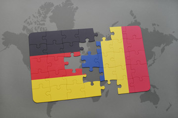 puzzle with the national flag of germany and romania on a world map background.