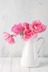 Pink roses in jug