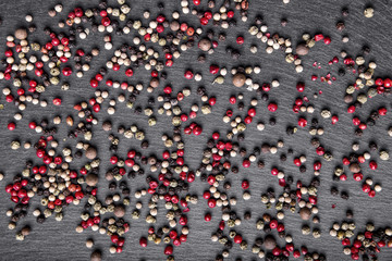 pepper scattered on the slate. top view