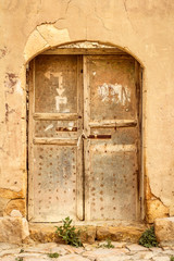 Old rusted iron door in Dana village in Jordan
