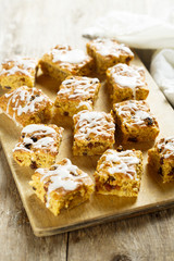 Cake with nut, raisins and sugar glaze