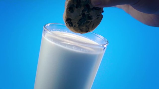 Dunking A Cookie in Milk