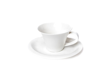 Closeup of an empty cup of coffee and a plate