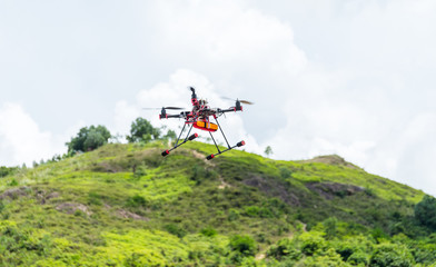 Fototapeta na wymiar Professional drone with gps making a ride