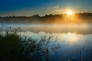 Sunrise over  Sawinda Wielka Lake. Masuria. Poland.