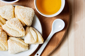 Cheese cookies with honey and jam as a countryside breakfast