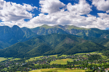 View of village, valley and mountains, Tatra, Poland.