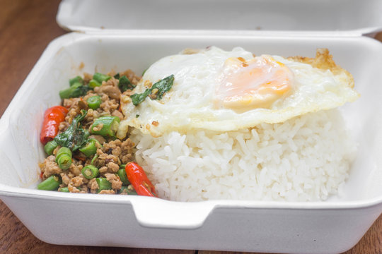 Rice topped with stir fried minced pork and basil. Thai food