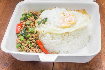 Rice topped with stir fried minced pork and basil. Thai food