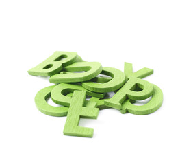 Pile of painted wooden letters isolated
