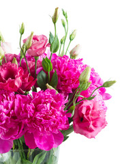 Bright pink peony and eustoma flowers bouquet in blue pot isolated on white background
