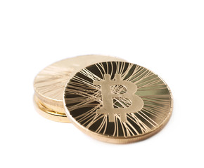 Pile of bitcoin currency tokens isolated