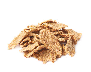 Pile of wholegrain cereal flakes isolated