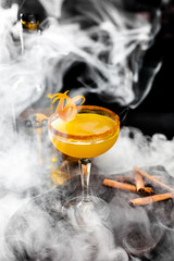 Orange cocktail with cinnamon