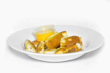 Garlic bread sticks in the dish.