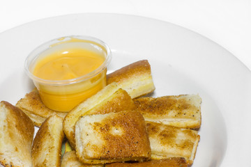 Garlic bread sticks in the dish.
