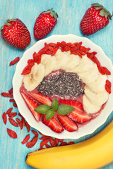 berry smoothie with banana, berries and seeds of chia