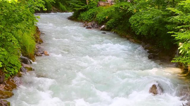 Rapids on Partnach River under Partnachklamm is a scenic location and nature attraction in Germany near Garmisch Paterkirchen.