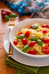 Farfalle pasta with cherry tomatoes and basil