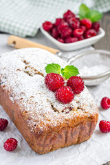 Banana bread with raspberries, cherries and white chocolate, vertical