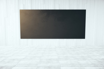 Naklejka premium Black billboard in concrete room