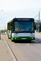 green passenger bus