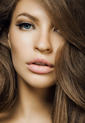Fototapeta premium beautiful girl with long hair. woman with blue eyes. professiona
