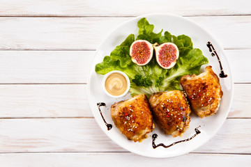 Roasted chicken thighs and vegetables