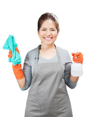 asian housewife holding spray bottle and rag isolated on white