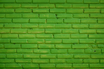 Decorative green brick wall pattern and painted