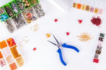 Process of making handmade jewelry. Equipment and accessories for needlework