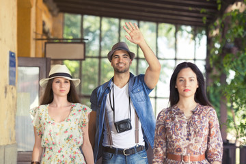 Vintage young people walking down at the train station.