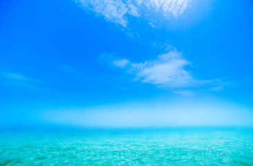 Obraz premium Abstract Blurry Sunny day sea paradise background. Blue sea and