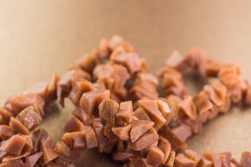 necklace made of brown stone