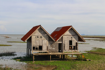 Abandoned house in Thale Noi lake at Phatthalung province,Thailand.