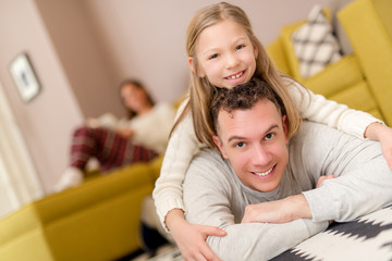 Family Relaxing At Home