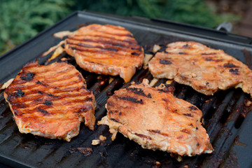 Porkneck fried on electric grill.