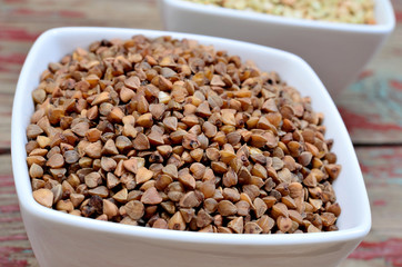  Buckwheat groats in ceramic bowl