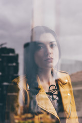 Obraz premium Double exposure of young beautiful caucasian brown hai rowman looking camera pensive - creative, thoughtful, thinking future concept