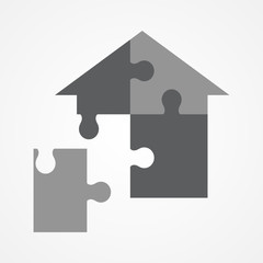 Jigsaw puzzle forming house shape