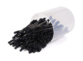 Cotton sticks,cotton wool,black-color is poured out of the box o